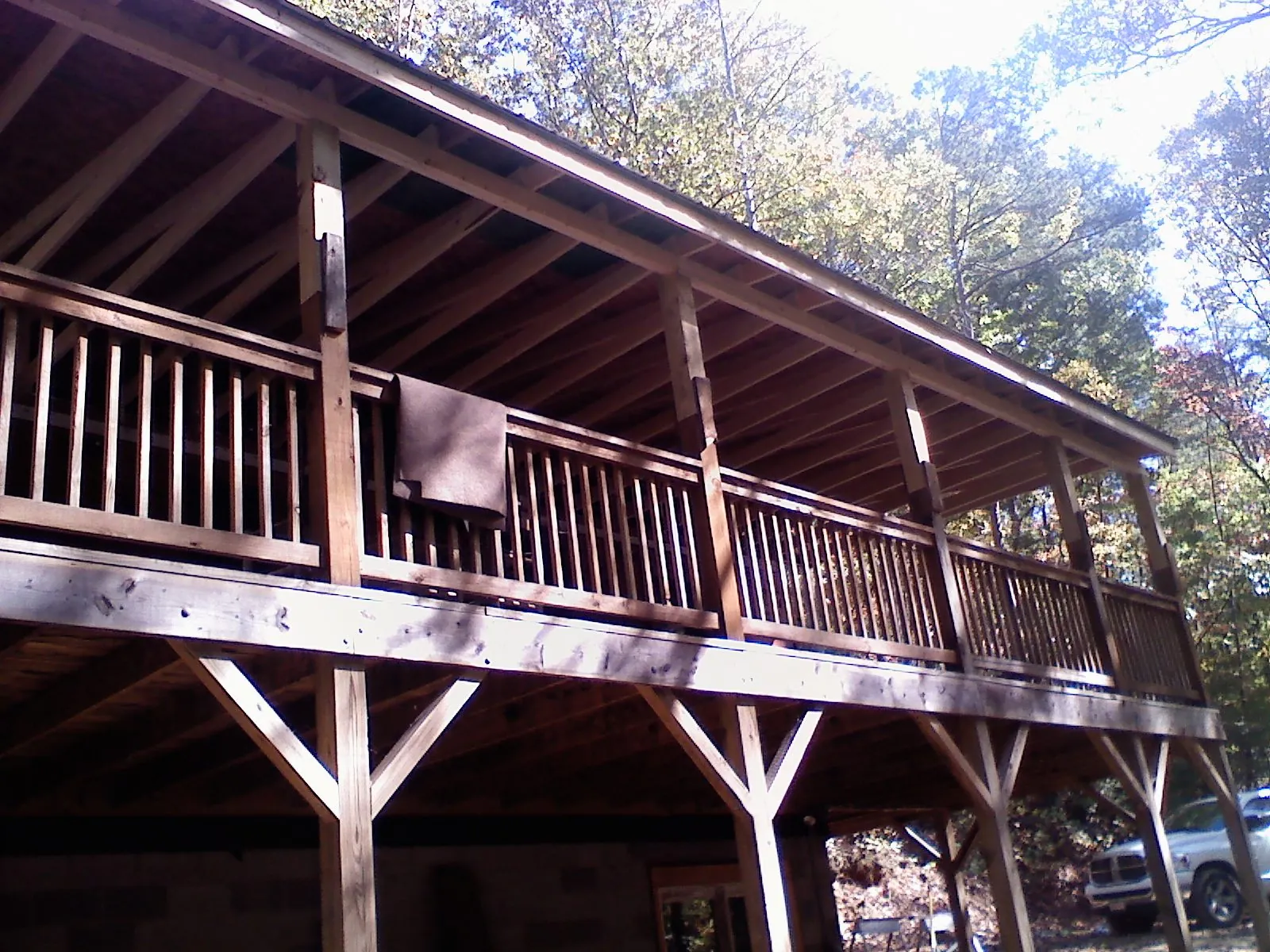 Timber framing under a new elevated porch and deck — Roof Leak Repair in Dumont by Roofing Brothers